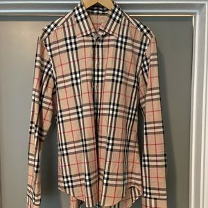 Men’s large authentic Burberry button shirt.